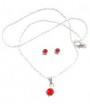 Pendentif sur chaine et boucles d'oreilles strass rouge